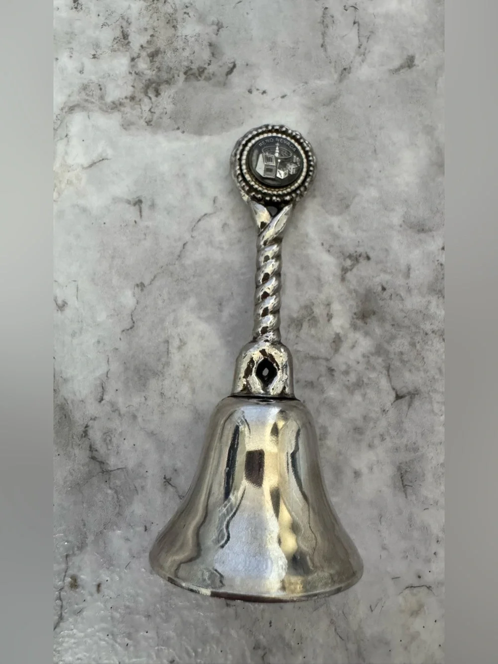 Silver Hand Bell with Nevada symbols Handle